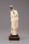 An ivory standing figure of a Meiren with wooden base