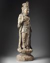 A large Chinese polychrome-decorated wood carving of Guanyin