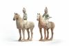 A pair of Chinese pottery equestrians