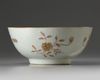 A Chinese iron-red and gilt-decorated moulded bowl