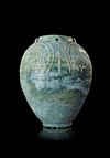 A LARGE UMAYYAD TURQUOISE-GREEN GLAZED JAR, MESOPOTAMIA, 7TH-8TH CENTURY