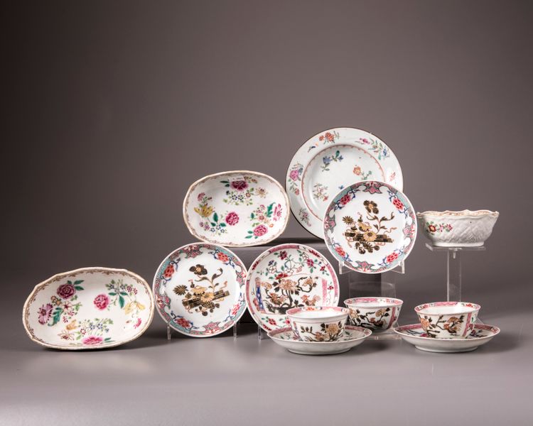 A group of twelve Chinese famille rose bowls, cups and saucers