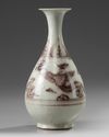 A Chinese Ming-style underglaze copper red 'phoenix' pear-shaped vase, yuhuchunping