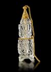 A FATIMID CARVED ROCK CYSTAL BOTTLE,  EGYPT 11TH-12TH CENTURY