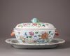 A Chinese famille rose tureen, cover, and stand