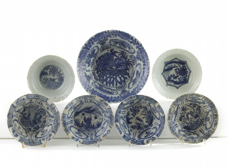 A group of seven Chinese blue and white moulded ‘Kraak porselein’ small bowls