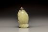 A yellow bowenite 'fish' snuff bottle
