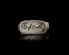 A SELJUK SILVER RING WITH ENGRAVED  SEAL, ANATOLIA OR CENTRAL ASIA, 12TH-13TH CENTURY