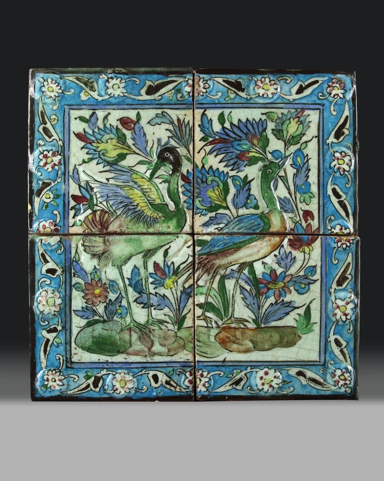 A QAJAR MOULDED POTTERY TILES PANEL, PERSIA, 19TH-20TH CENTURY
