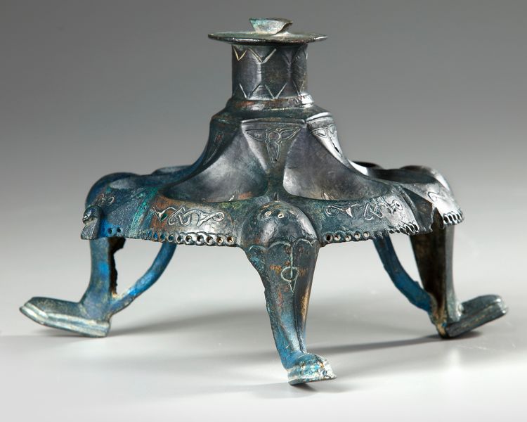 A KHORASAN SILVER INLAY LAMP STAND BASE, PERSIA, 12TH CENTURY