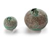 TWO FATIMID SILVER TALISMAN HOLDERS, EGYPT, 11TH CENTURY