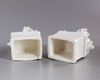 A PAIR OF CHINESE BLANC DE CHINE BUDDHIST LIONS