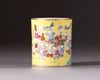 A Chinese yellow-ground famille rose brush pot, bitong