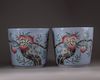 A pair of Chinese blue-ground famille rose 'nine peach' jardinieres