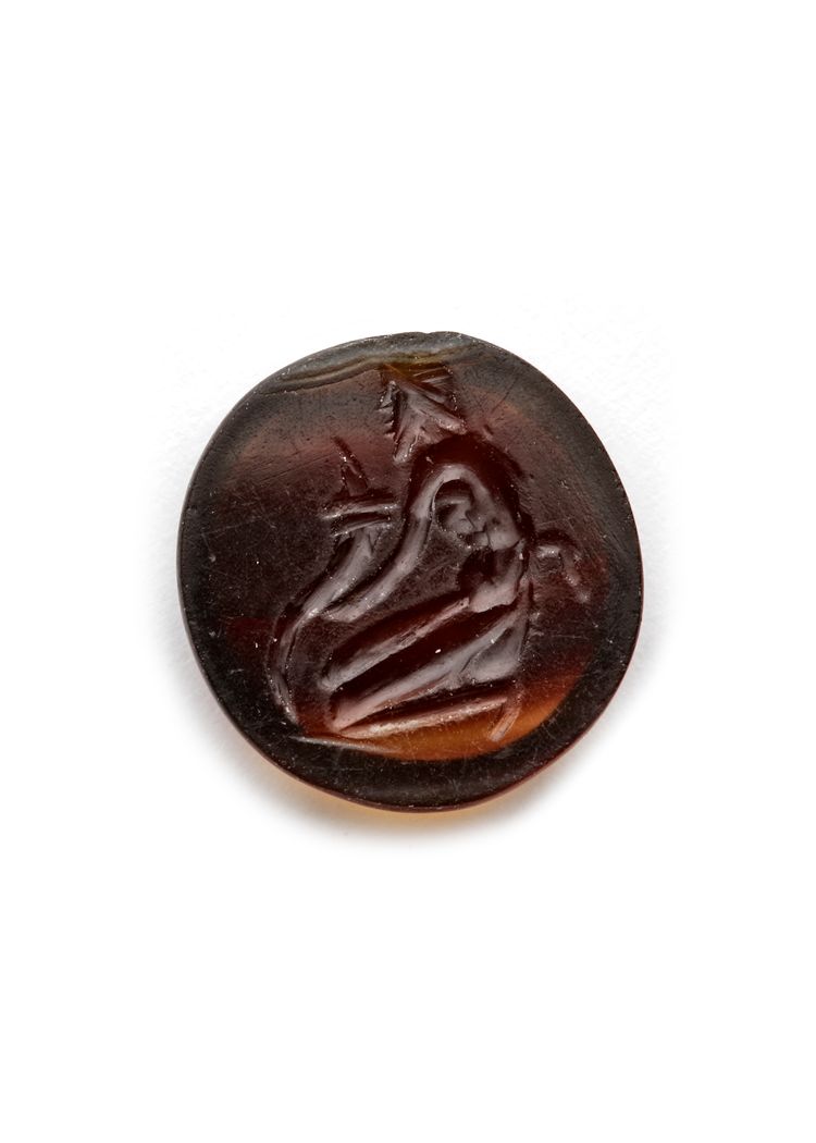 A ROMAN INTAGLIO OF A SATYR, 1ST CENTURY BC-AD