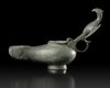 A BYZANTINE BRONZE OIL LAMP, CIRCA 5TH-6TH CENTURY A.D.
