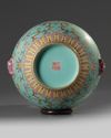A Chinese turquoise-ground famille rose double gourd vase