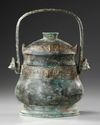 A CHINESE BRONZE RITUAL WINE VESSEL AND COVER, HAN DYNASTY OR LATER