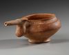 AN AMLASH TERRACOTTA PAINTED SPOUTED VESSEL, CIRCA EARLY 1ST MILLENNIUM B.C.