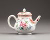 A Chinese famille rose teapot and cover