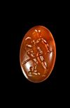 A CARNELIAN INTAGLIO SHOWING A NAKED WARRIOR, HELLENISTIC 2ND-1ST CENTURY BC