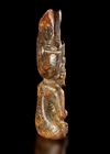 A RUSSET JADE SITTING FIGURE WEARING A PIG DRAGON ON IT'S HEAD, CHIN, HONGSHAN CULTURE