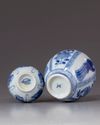 Two blue and white miniature vessels