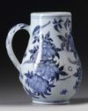 A JAPANESE ARITA BLUE AND WHITE JUG, 17TH CENTURY