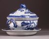 A Chinese blue and white tureen, cover, and stand