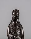 A Chinese bronze figure of a lady