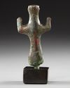 AN ELAMITE BRONZE FEMALE FIGURE, CIRCA 2ND MILLENNIUM B.C.