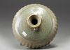 A celadon-crackle-glazed moulded jar