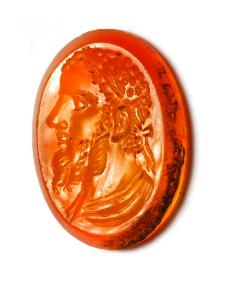 A ROMAN CARNELIAN INTAGLIO BUST OF EMPEROR, CIRCA 2ND-3RD CENTURY A.D.