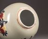 A Chinese celadon-ground 'nine peaches' ovoid jar