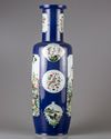 A blue glazed famille verte rouleau vase