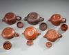 A group of six Chinese medium-sized yixing teapots