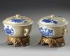 A PAIR OF CHINESE CAFE-AU-LAIT-GROUND BLUE AND WHITE POTICHES AND COVER, KANGXI PERIOD (1662-1722)