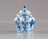 A SMALL CHINESE BLUE AND WHITE TEAPOT