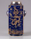 A gilt blue-ground cong vase