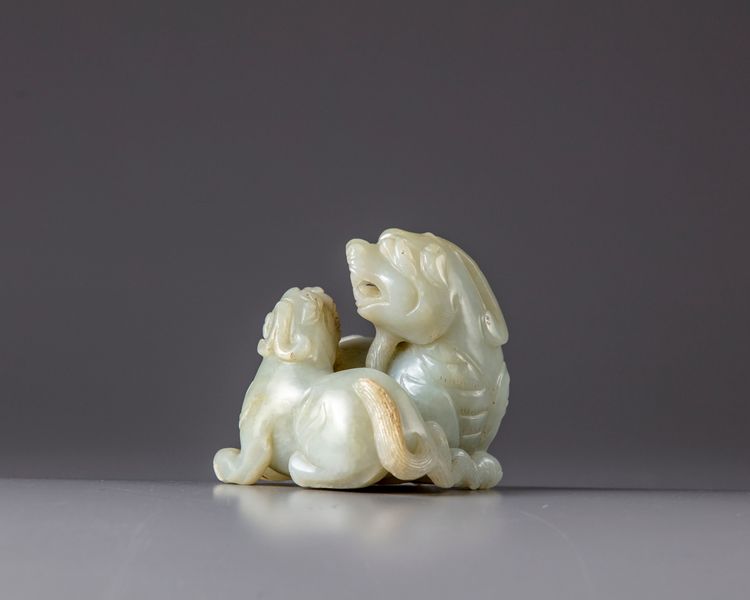 A Chinese celadon jade ‘twin qilin’ carving