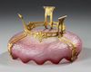 A FRENCH ART NOUVEAU CRANBERRY MAT GLASS BOWL ON A GOLD PLATED BRONZE FOOT, CIRCA 1880-1890