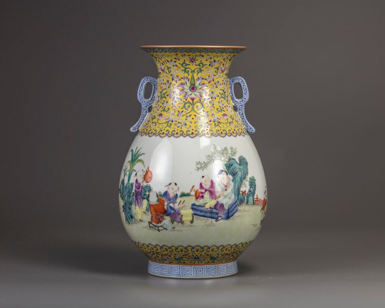 A Chinese yellow-ground famille rose 'boys' pear-shaped vase