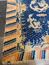 A CHINESE DRAGON RUG, EARLY 20TH CENTURY
