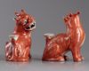 A pair of Chinese iron red glazed fu lions