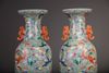 A PAIR OF CHINESE FAMILLE ROSE 'NINE DRAGON' VASES, 19TH-20TH CENTURY