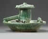 A Chinese green-glazed pottery frog pond