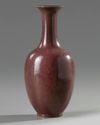 A Chinese aubergine-glazed incised-decorated 'dragon' vase