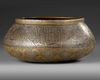 A PERSIAN SILVER INLAID BRASS BASIN, ILKHANID 14TH CENTURY