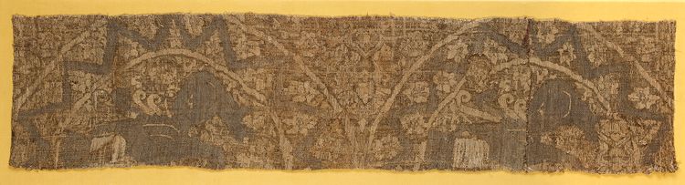 A RARE SELJUK WOVEN METAL THREAD BROCADE PANEL DEPICTING SPHINXES,  PERSIA, 11TH-12TH CENTURY
