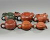 A group of six Chinese small yixing teapots